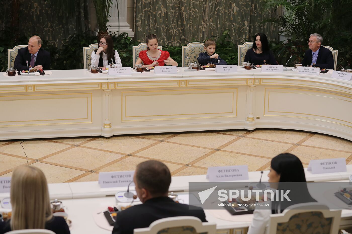 Russian President Vladimir Putin meets with winners of Family of the Year national contest