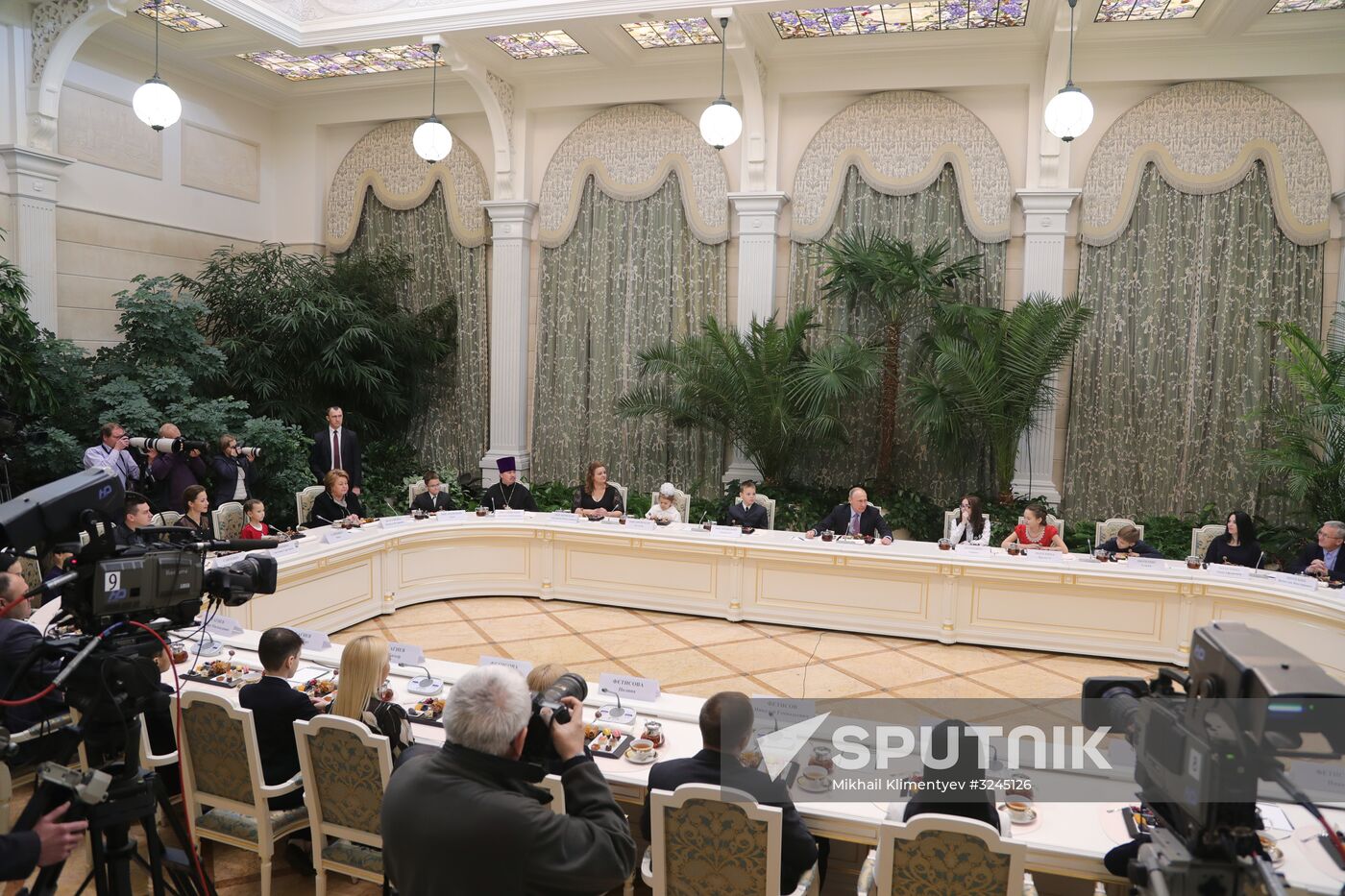 Russian President Vladimir Putin meets with winners of Family of the Year national contest