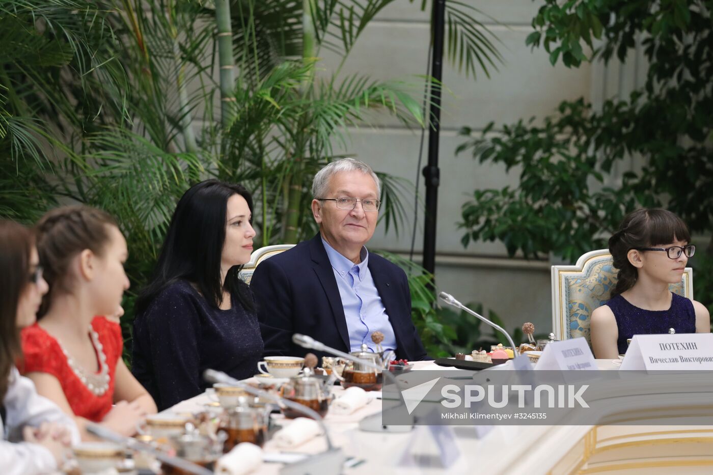 Russian President Vladimir Putin meets with winners of Family of the Year national contest