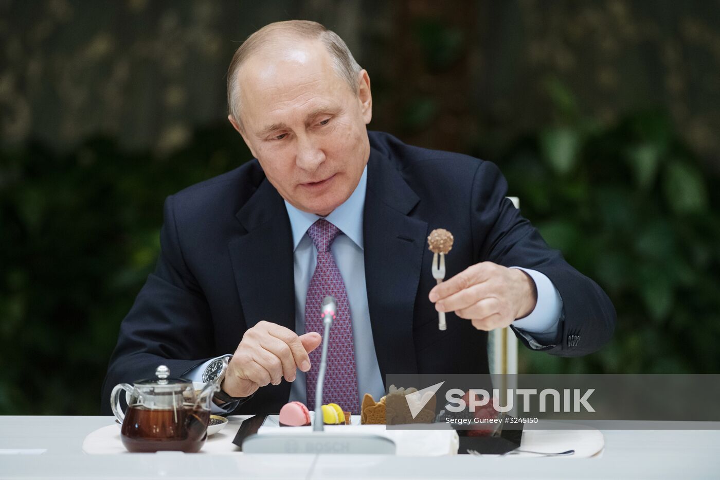 Russian President Vladimir Putin meets with winners of Family of the Year national contest