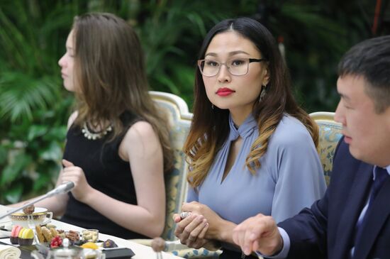 Russian President Vladimir Putin meets with winners of Family of the Year national contest