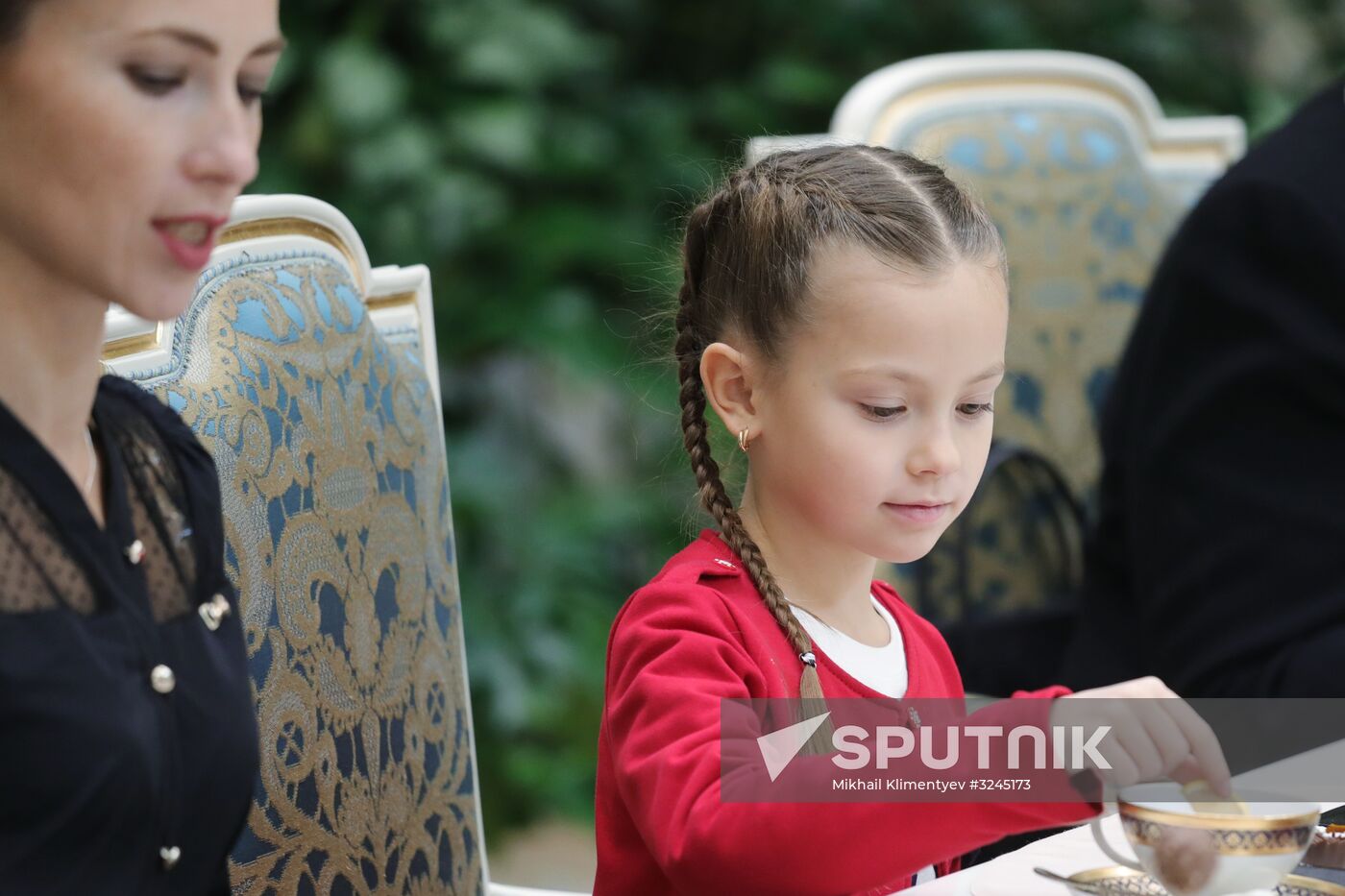 Russian President Vladimir Putin meets with winners of Family of the Year national contest
