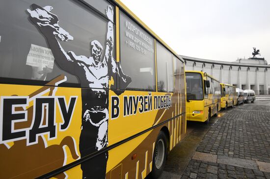 Presentation of Trip to Victory Museum branded buses