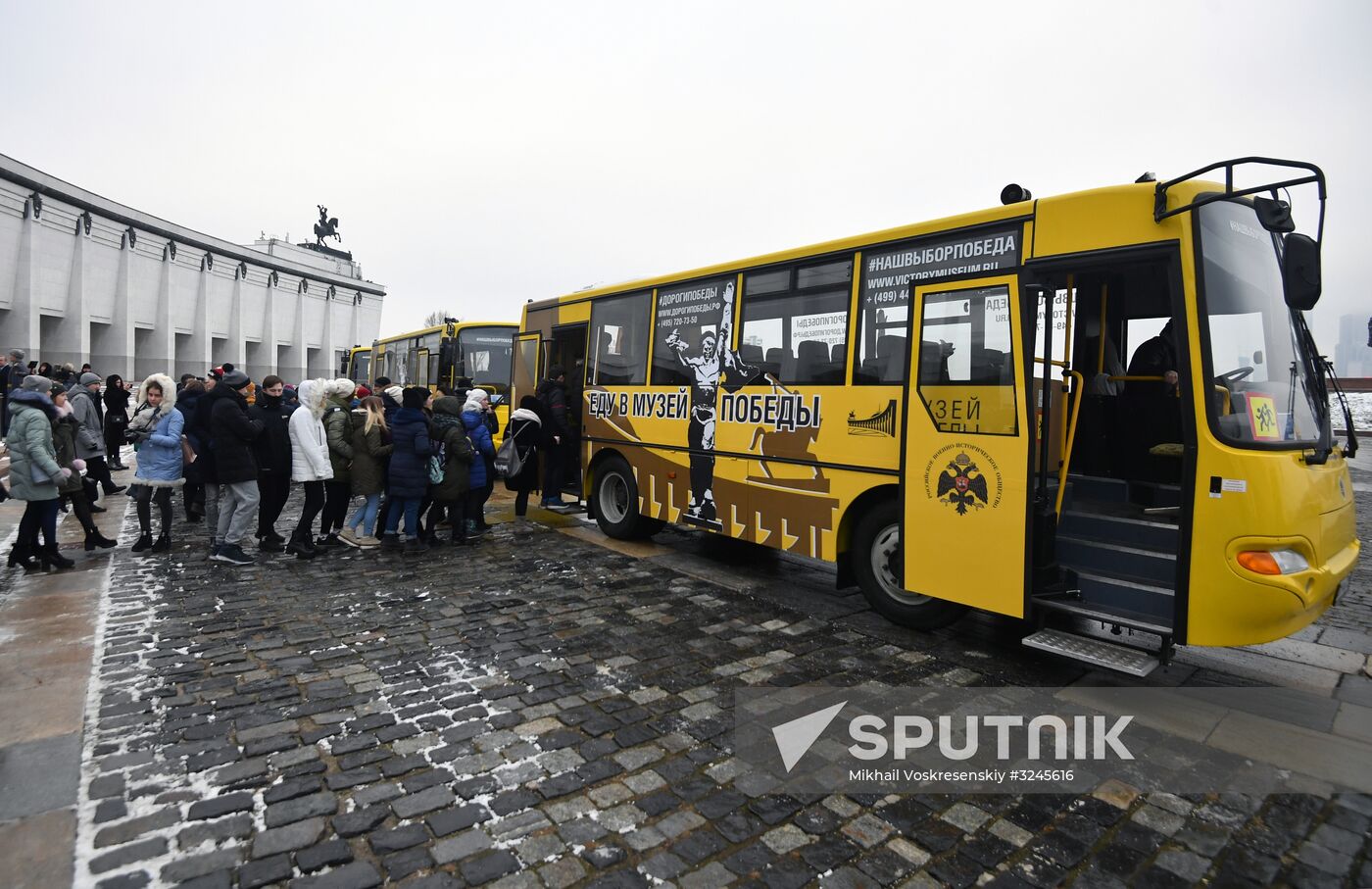 Presentation of Trip to Victory Museum branded buses