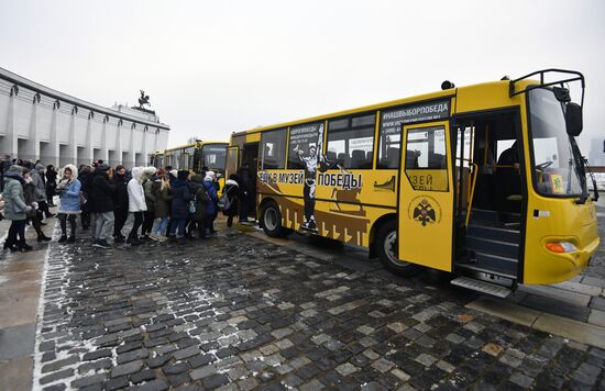 Presentation of Trip to Victory Museum branded buses