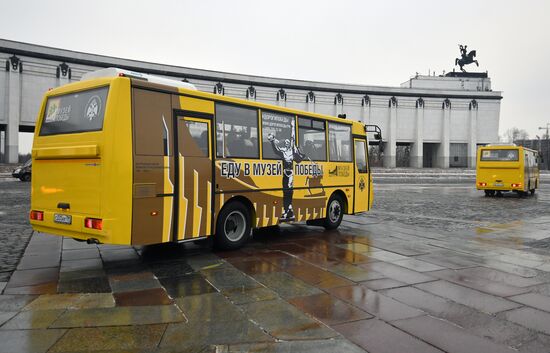 Presentation of Trip to Victory Museum branded buses