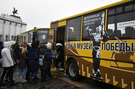 Presentation of Trip to Victory Museum branded buses