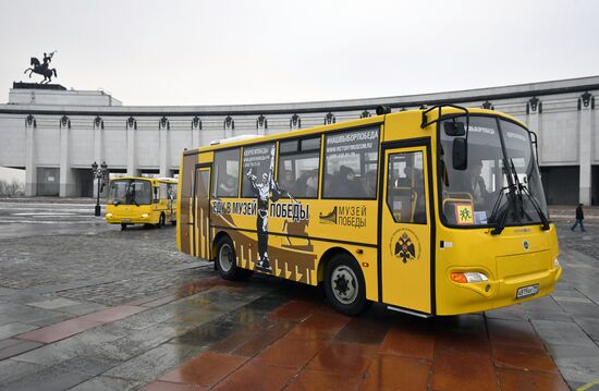 Presentation of Trip to Victory Museum branded buses