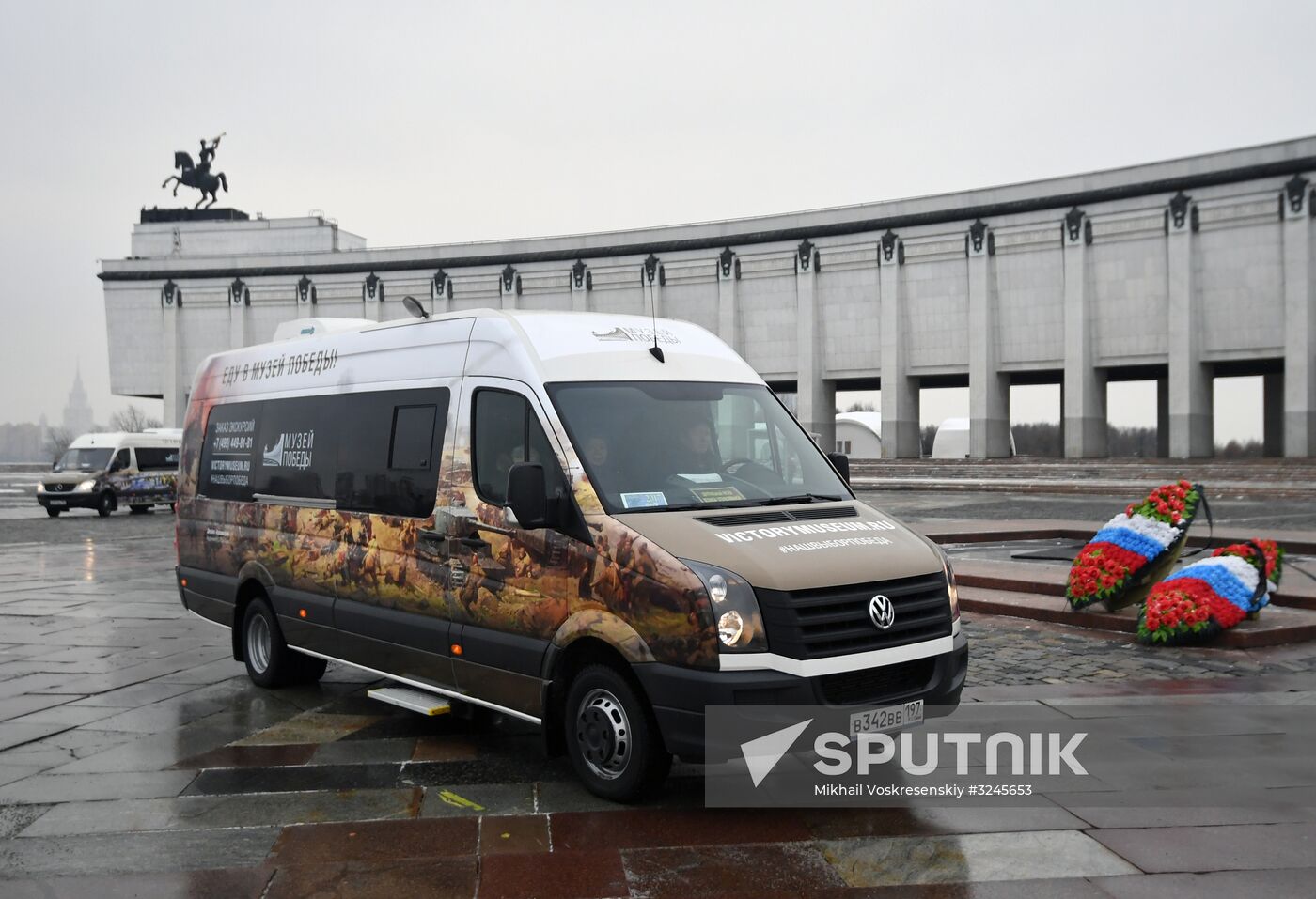 Presentation of Trip to Victory Museum branded buses
