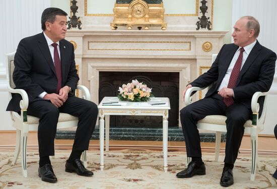 Russian President Vladimir Putin meets with Kyrgyz President Sooronbay Jeenbekov