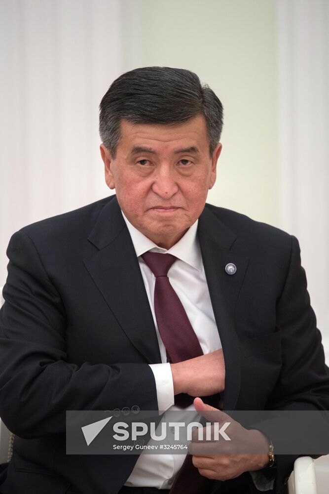 Russian President Vladimir Putin meets with Kyrgyz President Sooronbay Jeenbekov