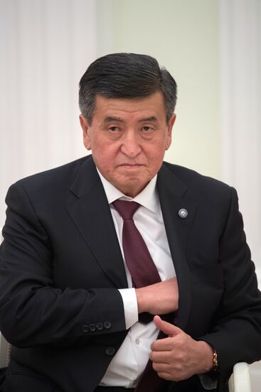 Russian President Vladimir Putin meets with Kyrgyz President Sooronbay Jeenbekov