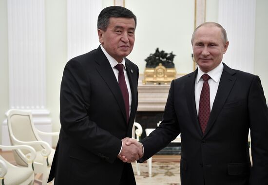 Russian President Vladimir Putin meets with Kyrgyz President Sooronbay Jeenbekov