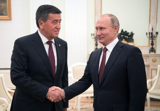 Russian President Vladimir Putin meets with Kyrgyz President Sooronbay Jeenbekov
