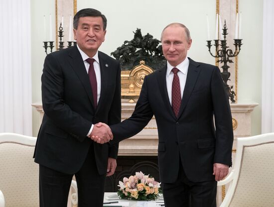 Russian President Vladimir Putin meets with Kyrgyz President Sooronbay Jeenbekov