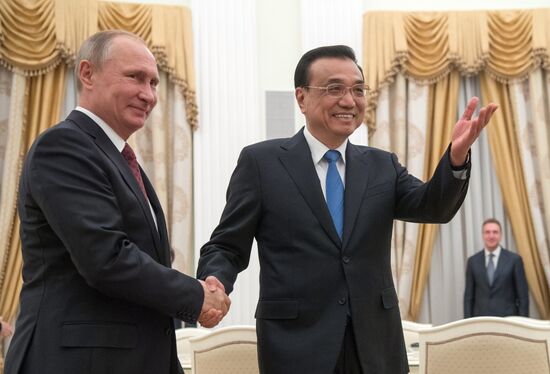 Russian President Vladimir Putin meets with Premier of People's Republic of China Li Keqiang