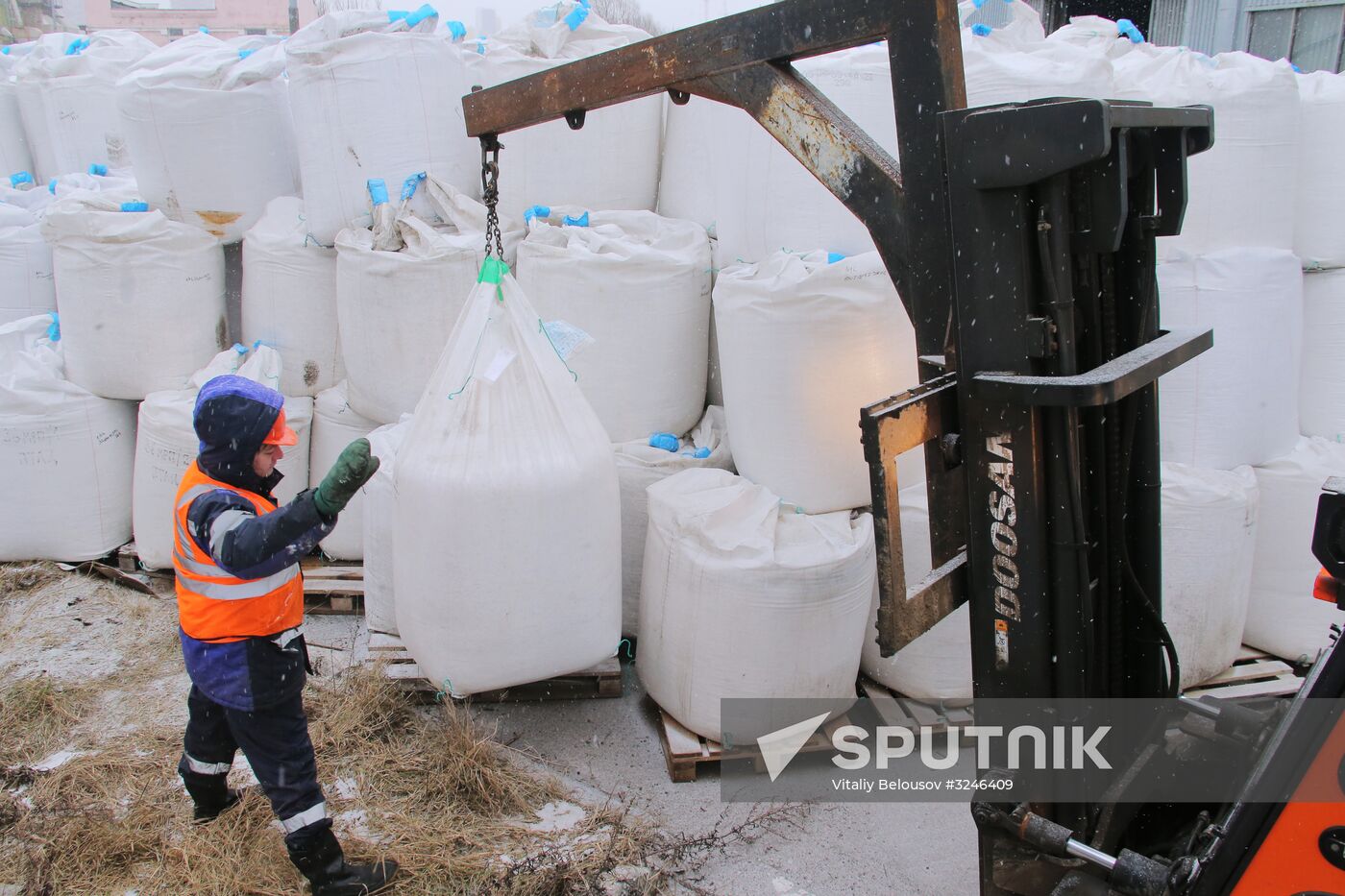 Treating roads with anti-icing materials