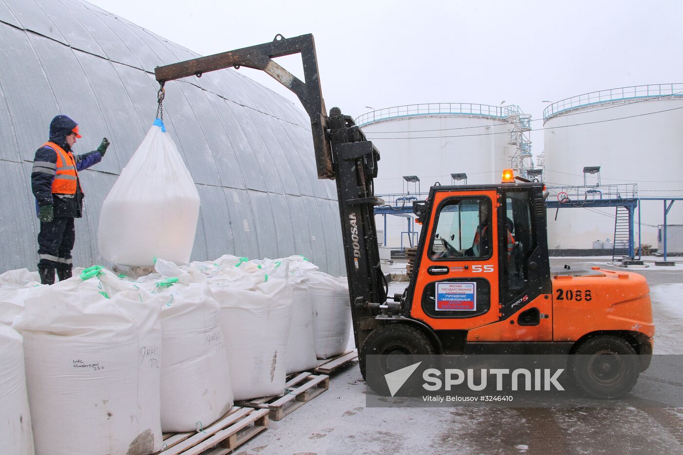Treating roads with anti-icing materials