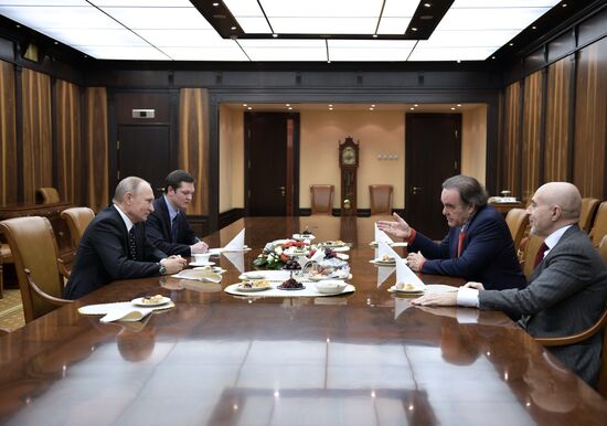 President Vladimir Putin meets with film director Oliver Stone