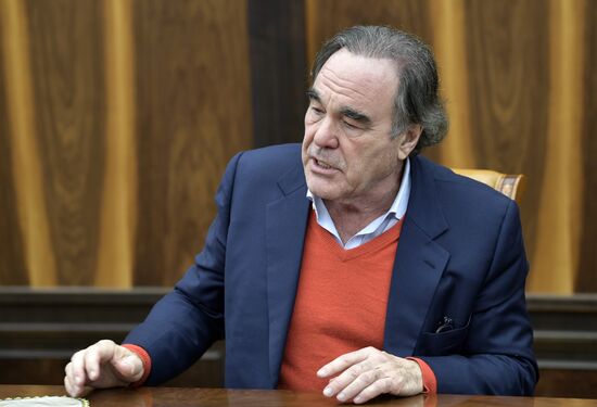 President Vladimir Putin meets with film director Oliver Stone