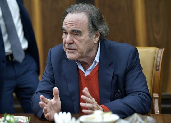 President Vladimir Putin meets with film director Oliver Stone