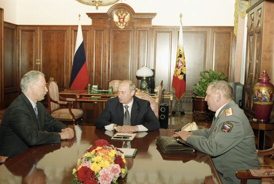 President Vladimir Putin, Interior Minister Boris Gryzlov and Head of State Traffic Safety Inspectorate Vladimir Fyodorov