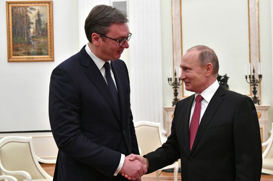 President Vladimir Putin meets with Serbian President Aleksandar Vucic
