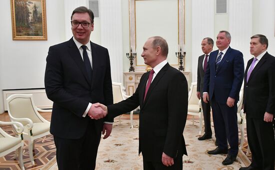 President Vladimir Putin meets with Serbian President Aleksandar Vucic