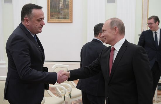 President Vladimir Putin meets with Serbian President Aleksandar Vucic