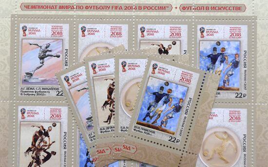 Four postage stamps featuring football in art are put in circulation