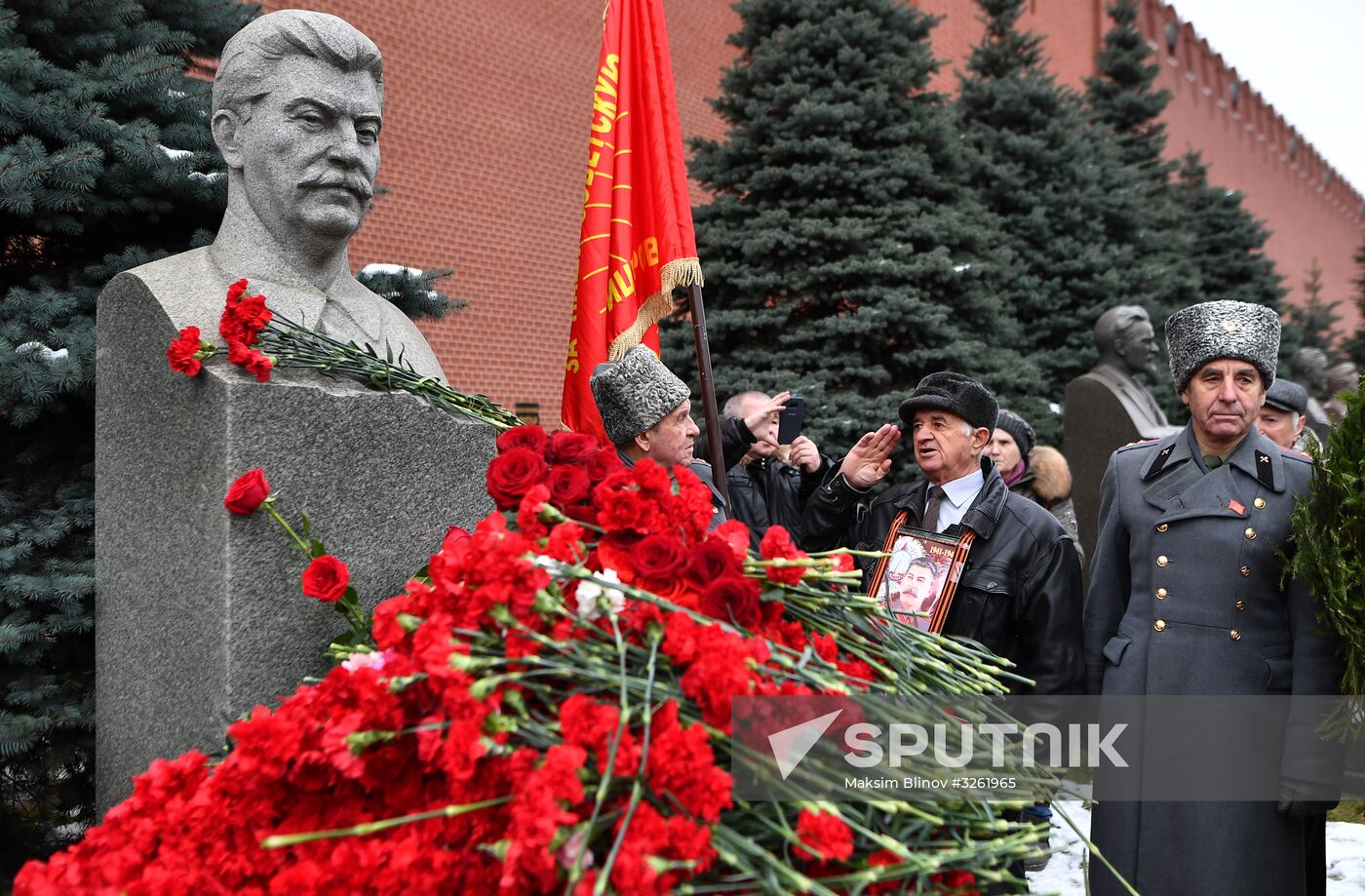 Laying flowers at Joseph Stalin and Felix Dzerzhinsky's graves near Kremlin Wall
