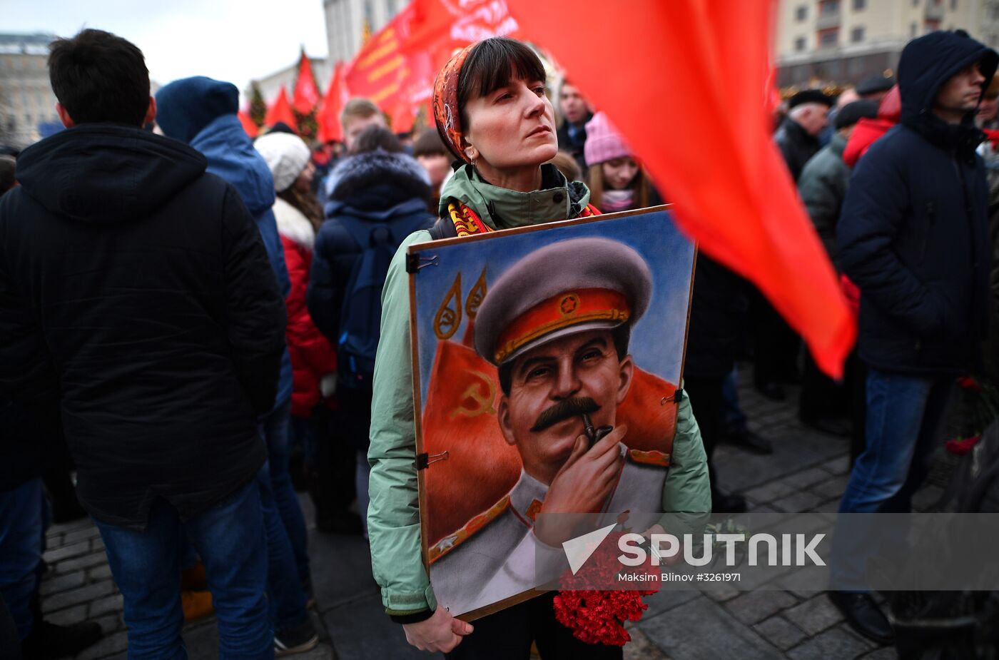 Laying flowers at Joseph Stalin and Felix Dzerzhinsky's graves near Kremlin Wall
