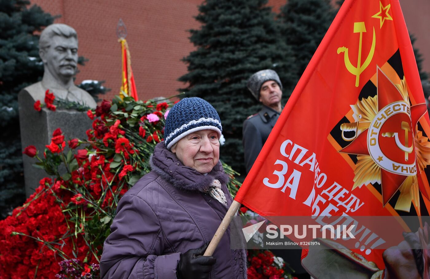 Laying flowers at Joseph Stalin and Felix Dzerzhinsky's graves near Kremlin Wall