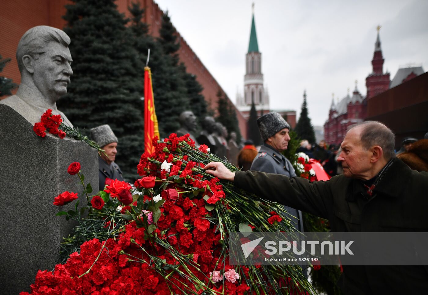 Laying flowers at Joseph Stalin and Felix Dzerzhinsky's graves near Kremlin Wall