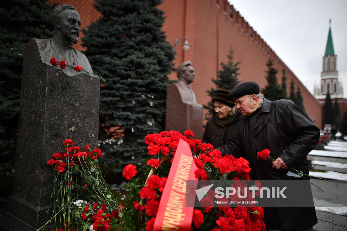 Laying flowers at Joseph Stalin and Felix Dzerzhinsky's graves near Kremlin Wall