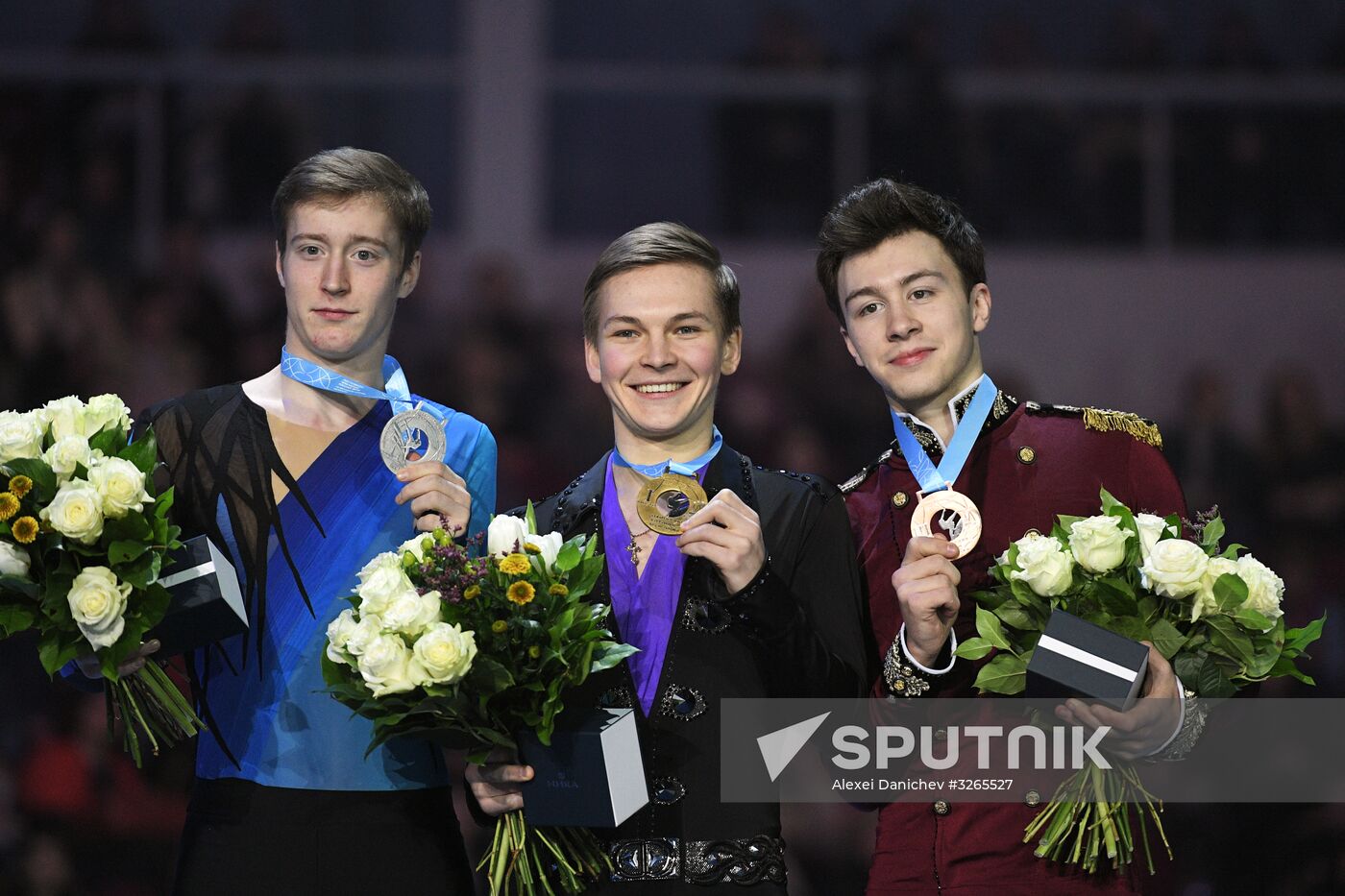 Russian FWinners of the men's competition at the Russian Figure Skating Championships during tigure Skating Championships. Awarding ceremony