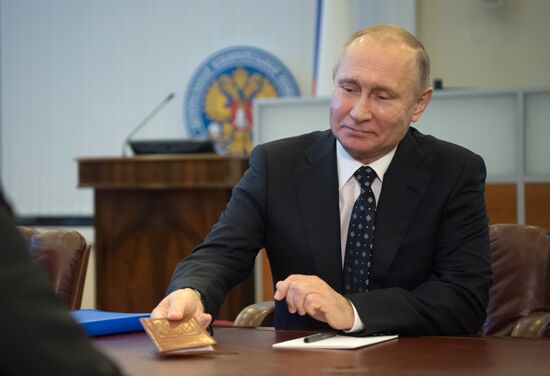 Vladimir Putin submits documents to Central Electoral Commission to register as presidential candidate