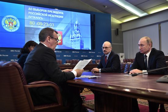 Vladimir Putin submits documents to Central Electoral Commission to register as presidential candidate