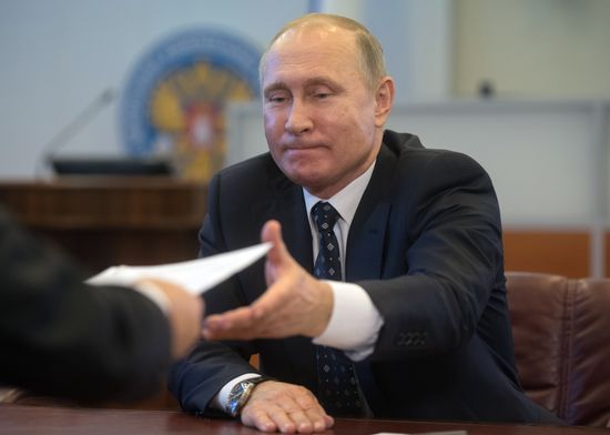 Vladimir Putin submits documents to Central Electoral Commission to register as presidential candidate