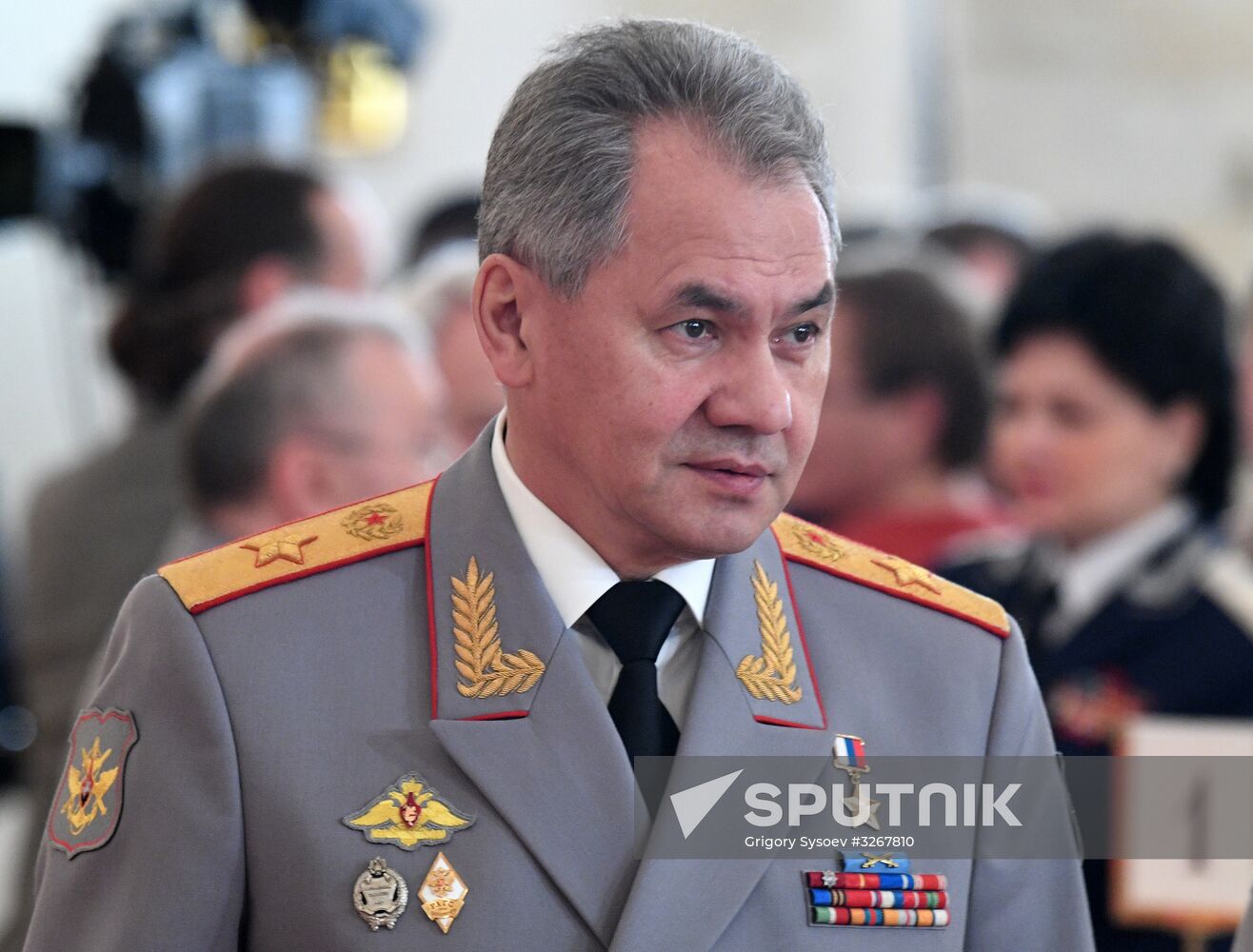 Russian President Vladimir Putin meets with service personnel who took part in counter-terrorism operation in Syria