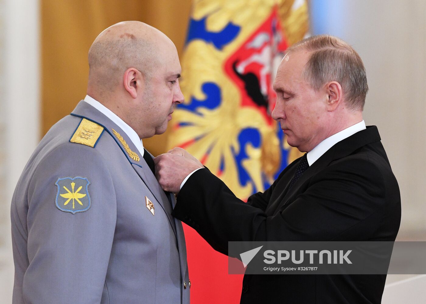 Russian President Vladimir Putin meets with service personnel who took part in counter-terrorism operation in Syria