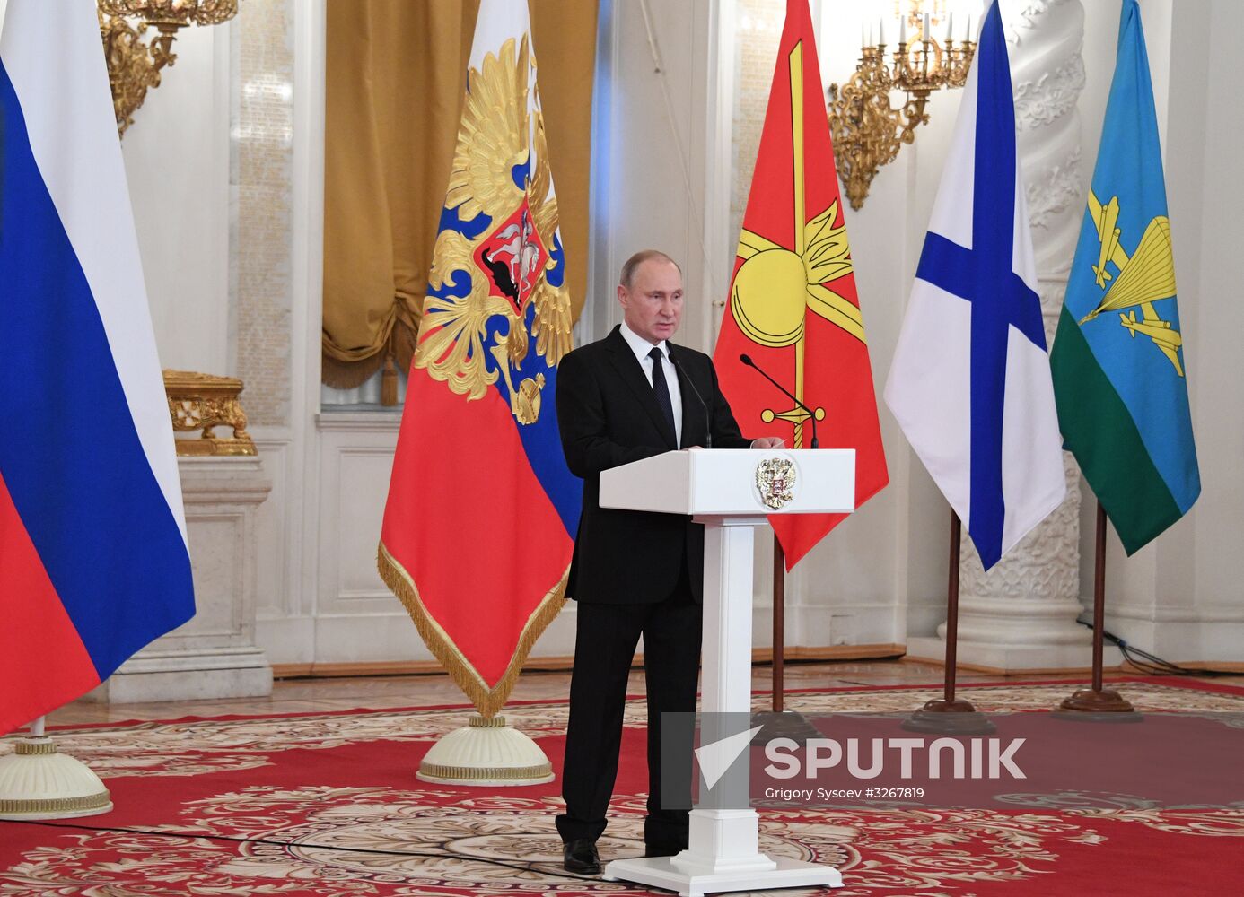 Russian President Vladimir Putin meets with service personnel who took part in counter-terrorism operation in Syria