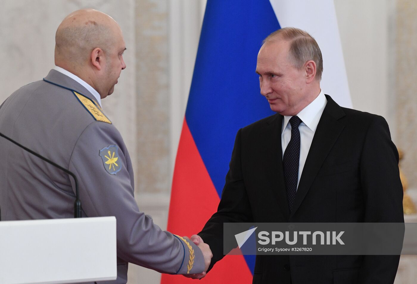 Russian President Vladimir Putin meets with service personnel who took part in counter-terrorism operation in Syria