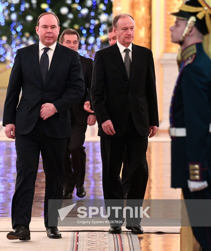 Russian President Vladimir Putin meets with service personnel who took part in counter-terrorism operation in Syria