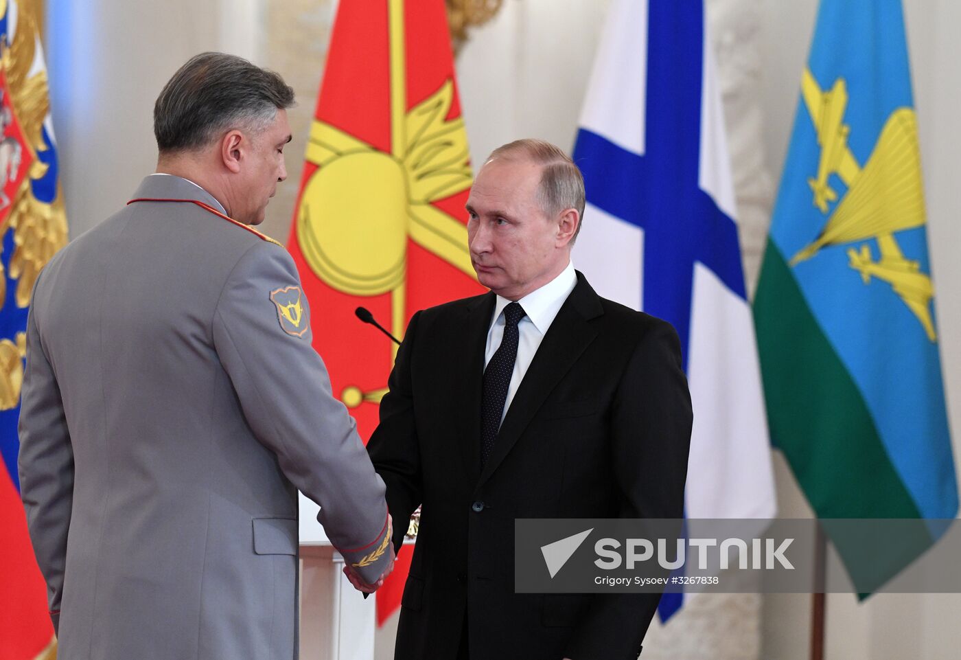 Russian President Vladimir Putin meets with service personnel who took part in counter-terrorism operation in Syria