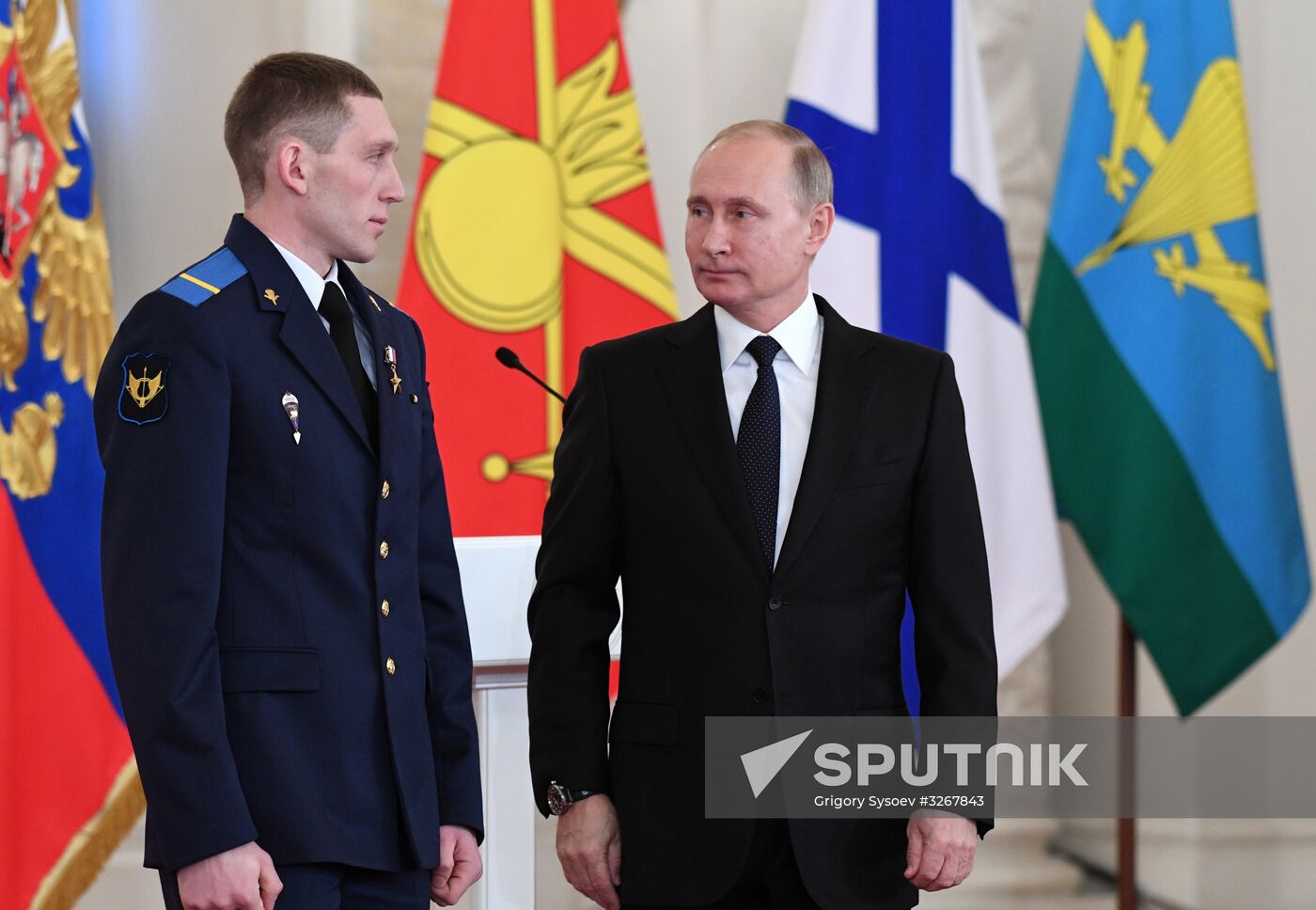 Russian President Vladimir Putin meets with service personnel who took part in counter-terrorism operation in Syria