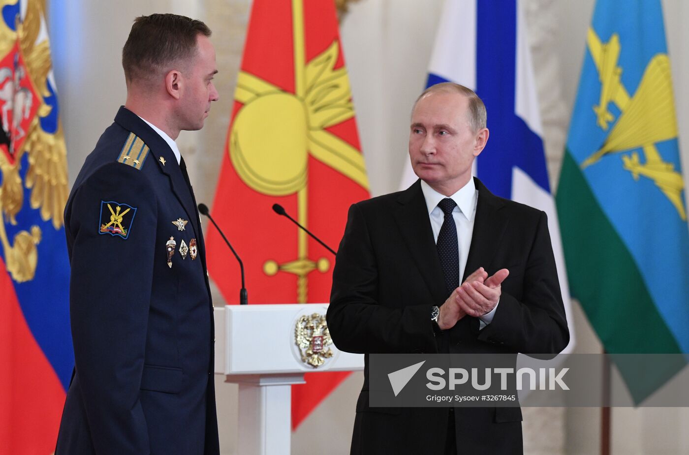 Russian President Vladimir Putin meets with service personnel who took part in counter-terrorism operation in Syria