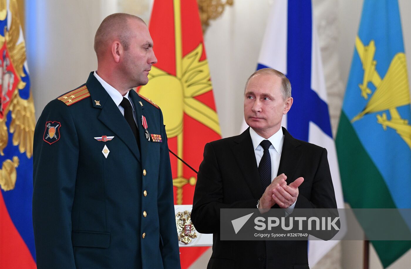 Russian President Vladimir Putin meets with service personnel who took part in counter-terrorism operation in Syria