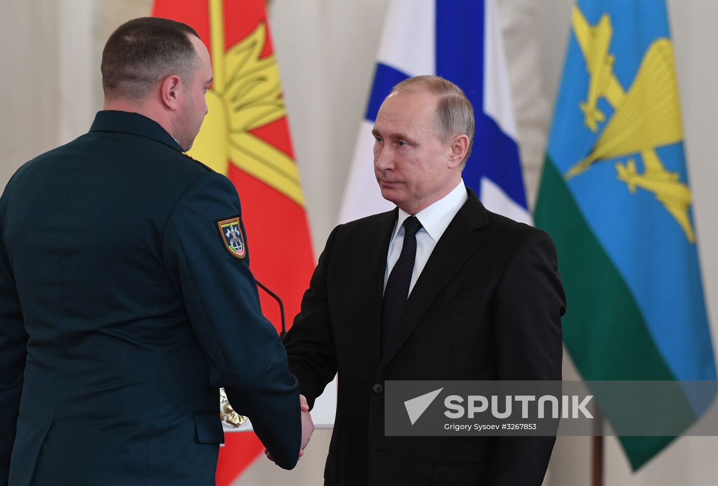 Russian President Vladimir Putin meets with service personnel who took part in counter-terrorism operation in Syria