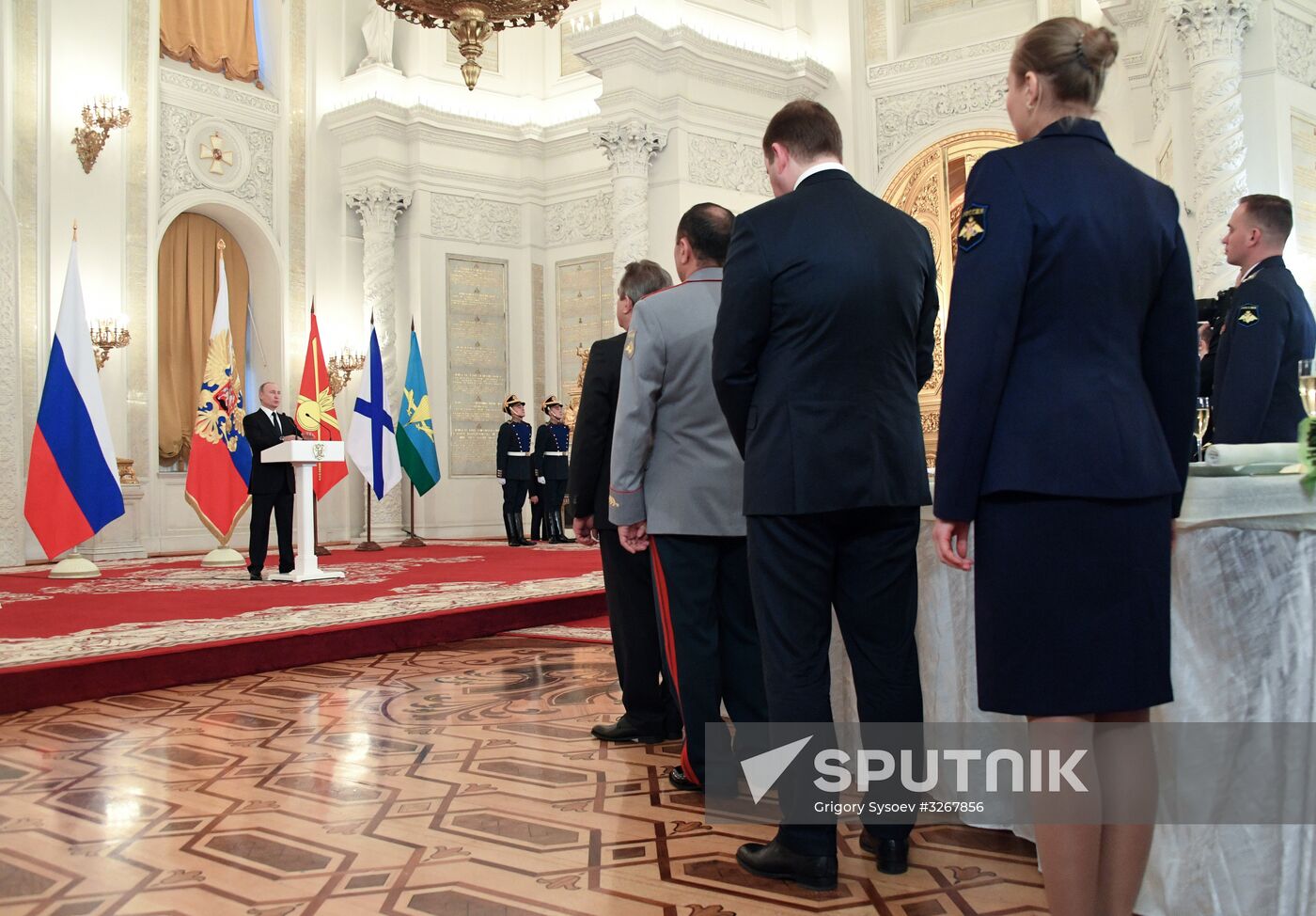 Russian President Vladimir Putin meets with service personnel who took part in counter-terrorism operation in Syria